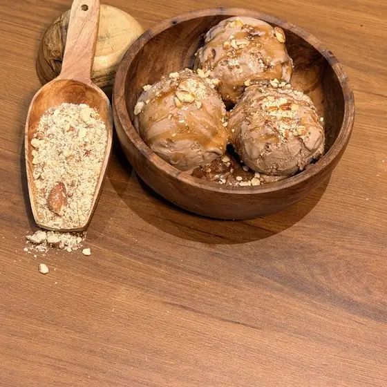 Almond Fudge Crunch sundae in a wooden bowl
