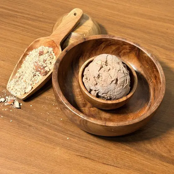 Chocolate Roasted Almond ice cream in a wooden bowl