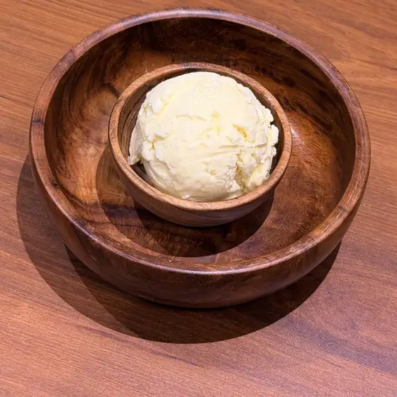 Rasmalai ice cream in a wooden bowl